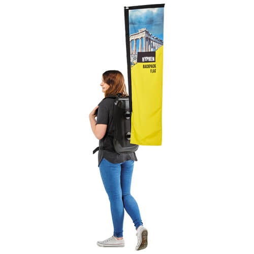 A woman with Hyphen Backpack Flag