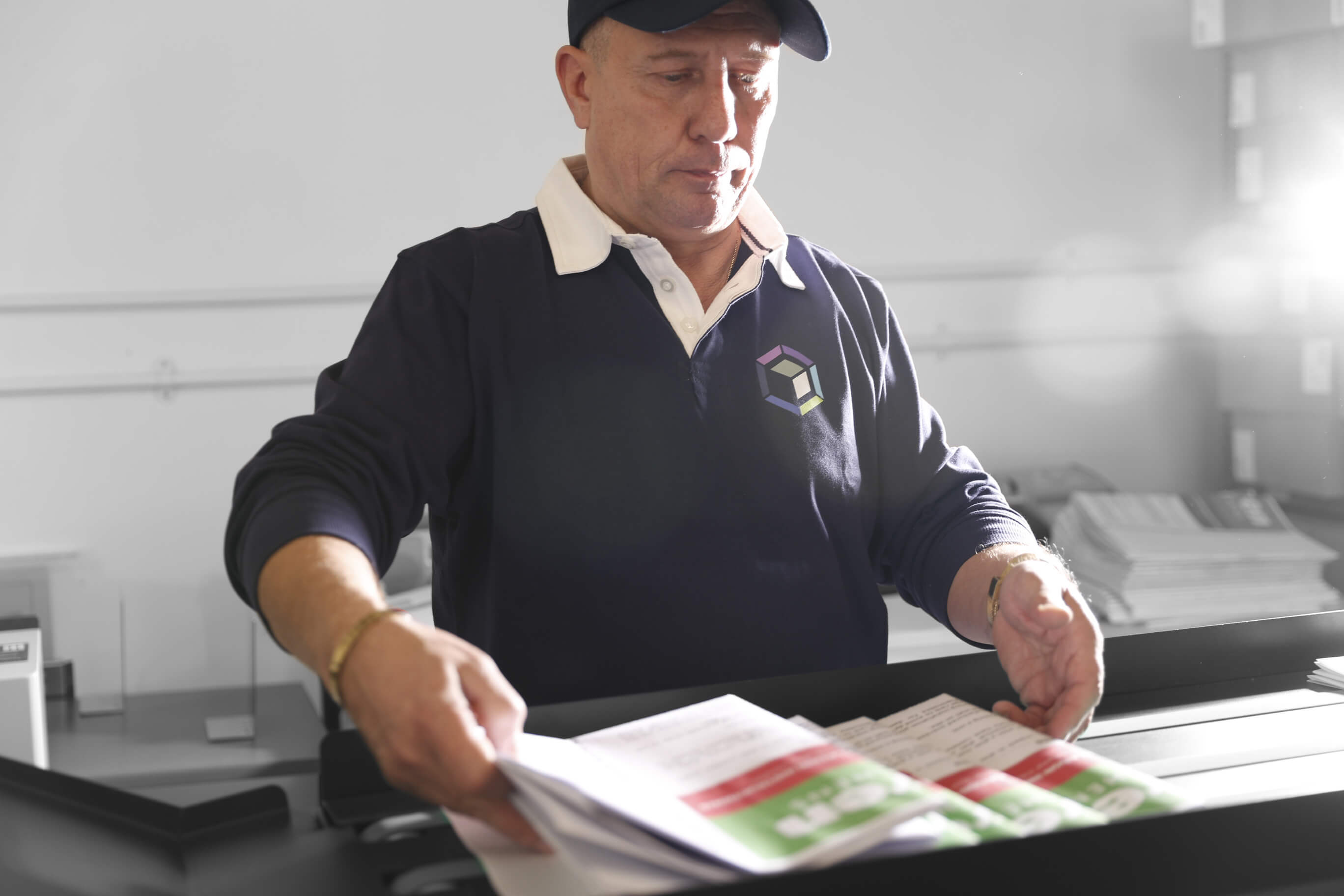 a man arranging news papers